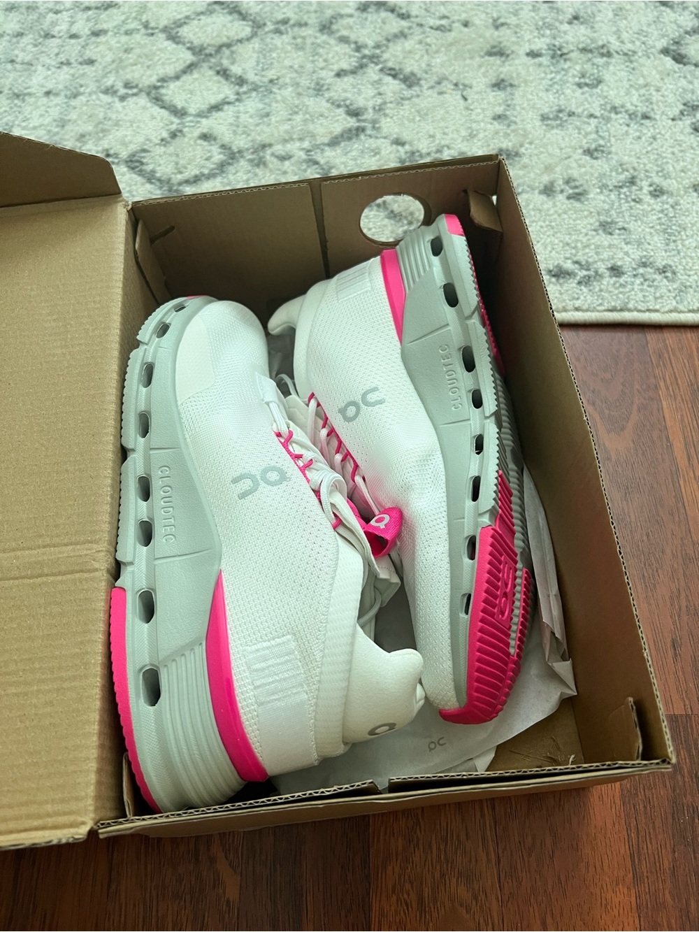 On Cloud White Athletic Sneakers with Pink Accents